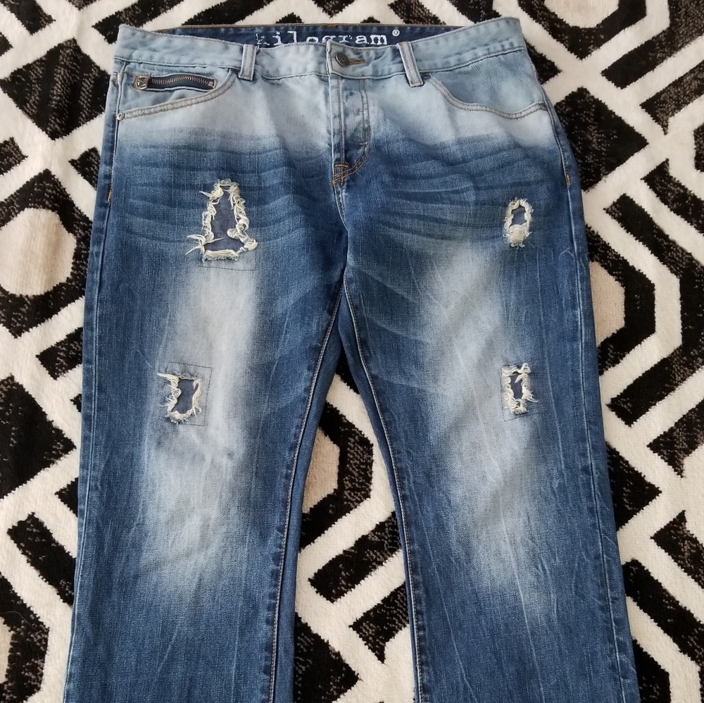 Slim distressed and repaired jeans